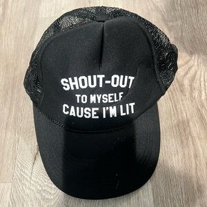 Black Mesh Trucker Hat with White Text